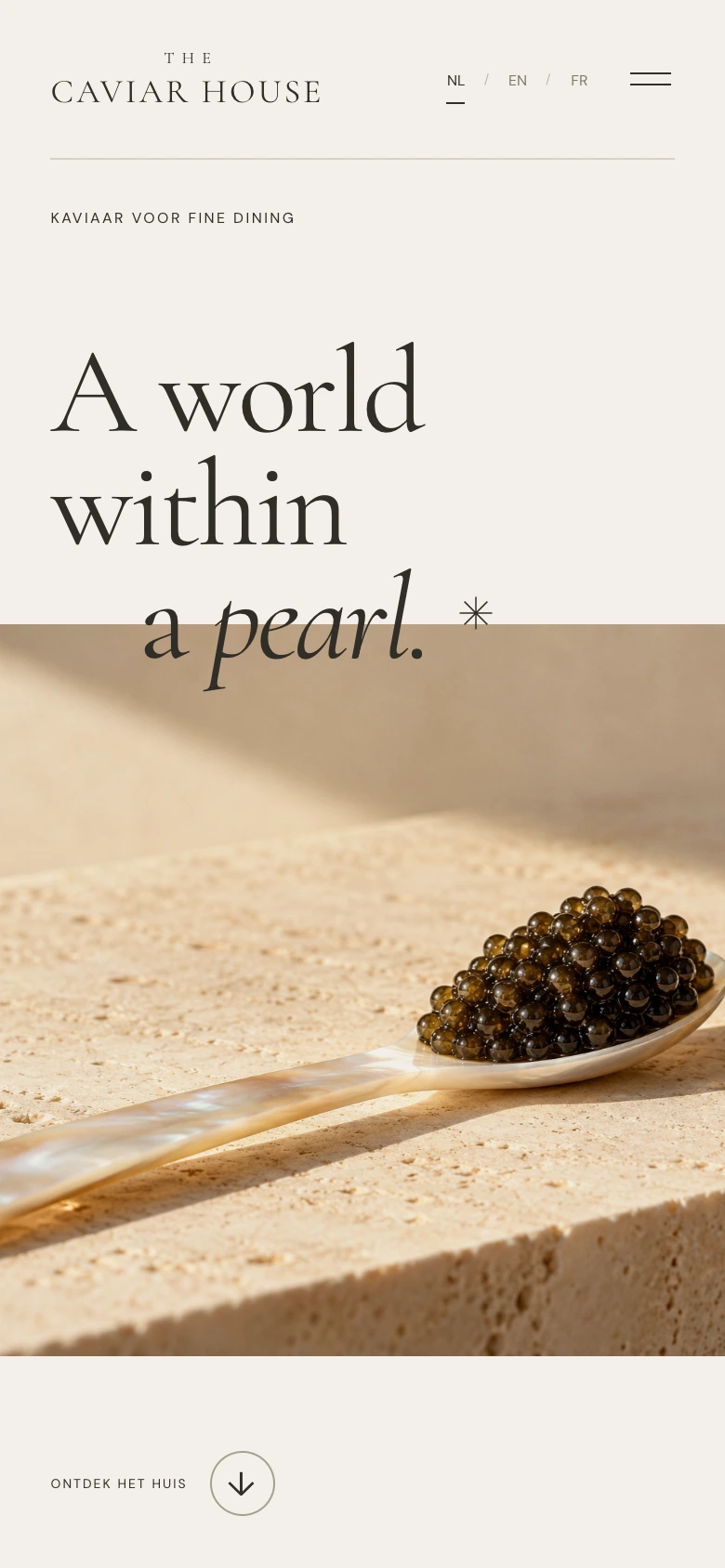 The actual Caviar House mobile homepage with caviar on a mother-of-pearl spoon